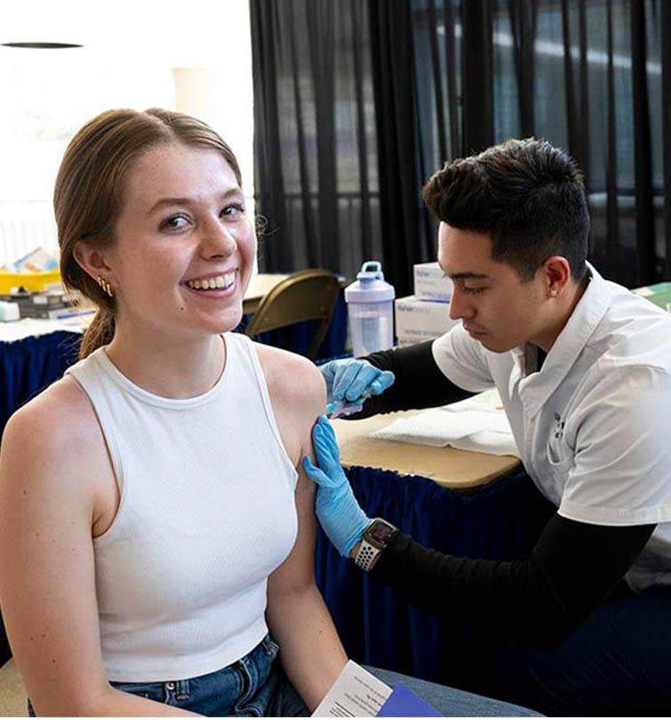 Student receiving a vaccine
